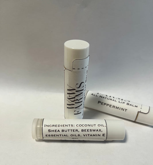 Lip balm with 1 standing up and two laying down